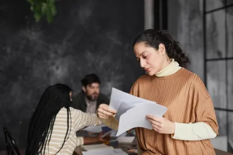 A compassionate social worker consults with a client, representing the diverse types of social work careers available.
